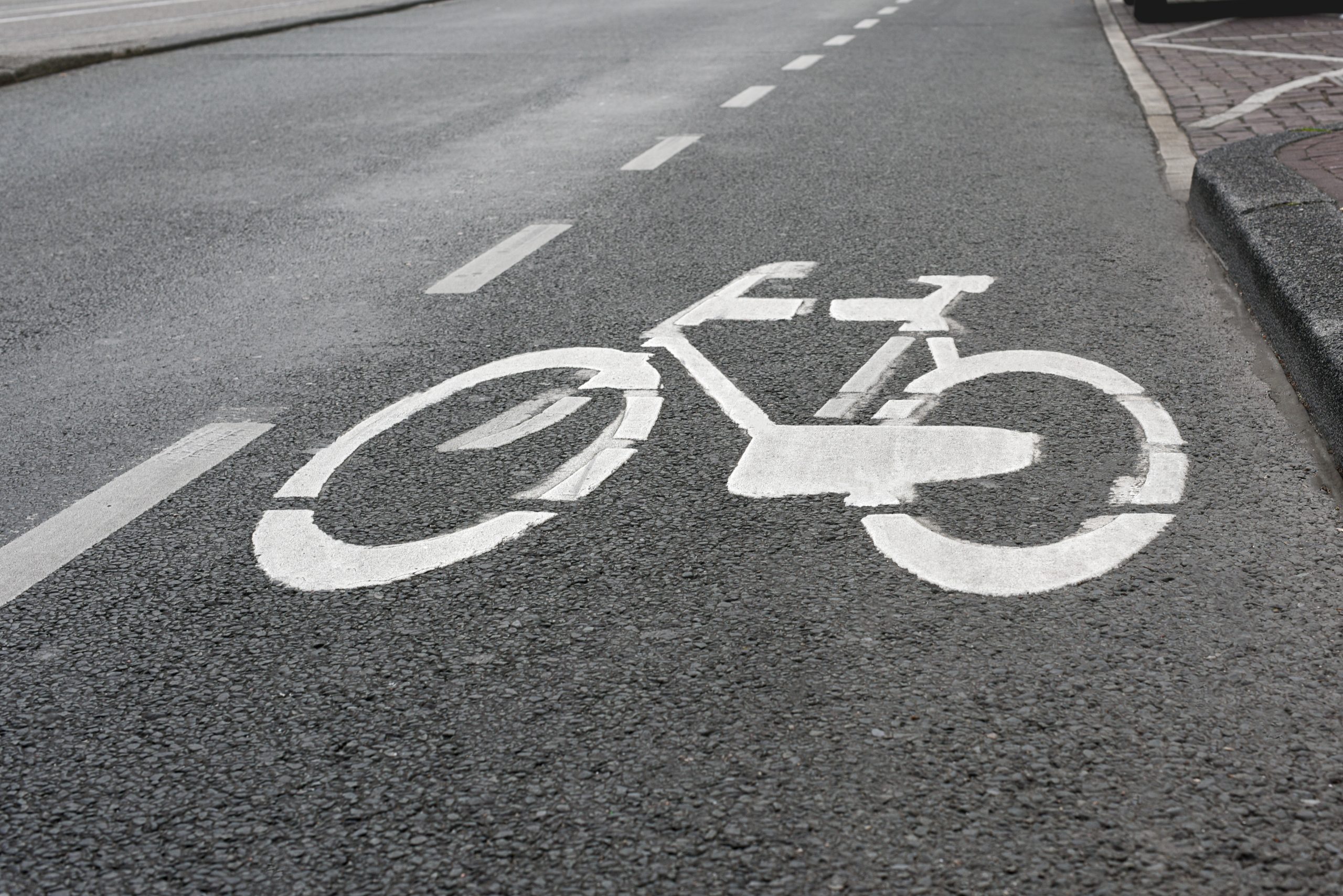 Sign bike on the pavement. Symbol to indicate the road for bicycles. Dominic Scott